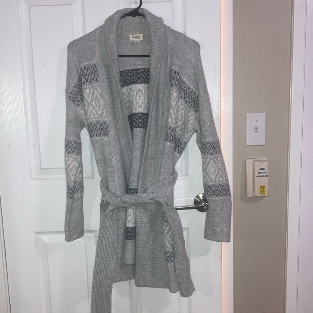 Cozy mid-length sweater. Indoor, outdoor use.